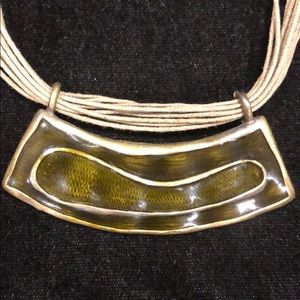Metal Olive Necklace on a thin, olive rope string.